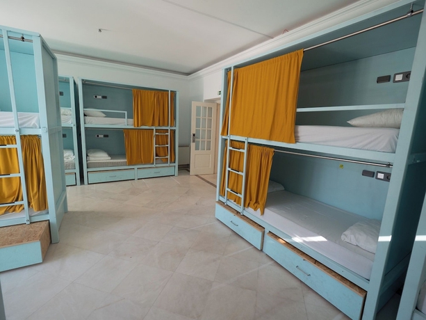 Imagen de la habitación del Hotel Impact Beach House. Foto 6