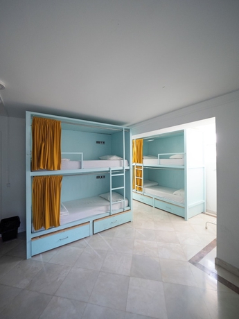 Imagen de la habitación del Hotel Impact Beach House. Foto 12