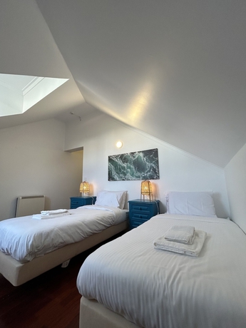 Imagen de la habitación del Hotel Impact Beach House. Foto 14