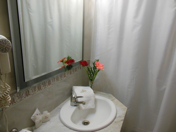 Imagen de la habitación del Hotel Impala. Foto 12