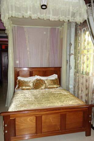 Imagen de la habitación del Hotel Impala Suites. Foto 16