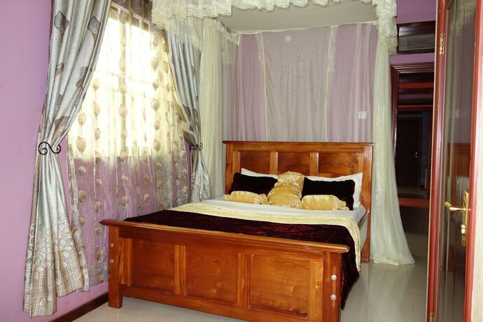 Imagen de la habitación del Hotel Impala Suites. Foto 23