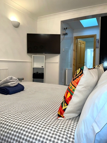 Imagen de la habitación del Hotel Impeccable Spacious 6-bed House in Romford. Foto 17
