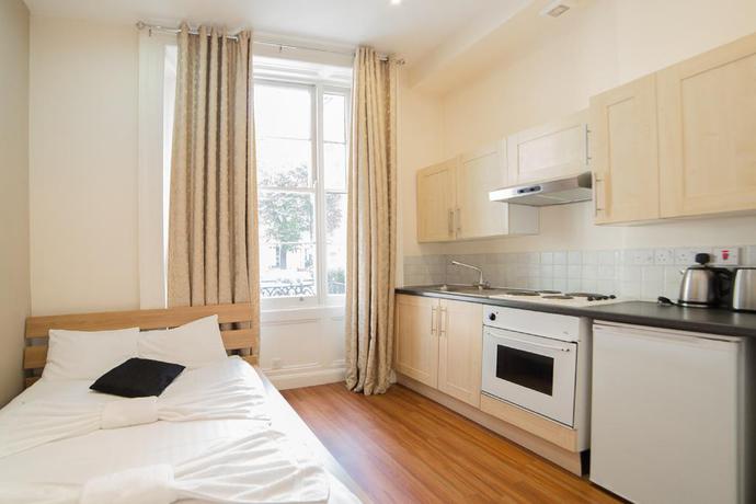 Imagen de la habitación del Hotel Imperial Court Studios. Foto 11