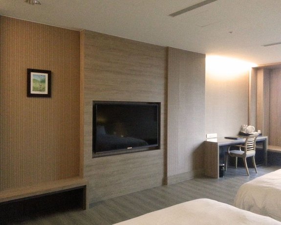 Imagen de la habitación del Hotel Imperial Dynasty Exquisite. Foto 8