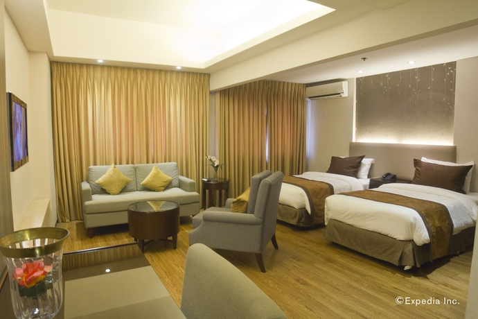 Imagen de la habitación del Hotel Imperial Palace Suites. Foto 4