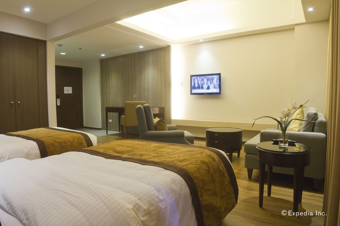 Imagen de la habitación del Hotel Imperial Palace Suites. Foto 6