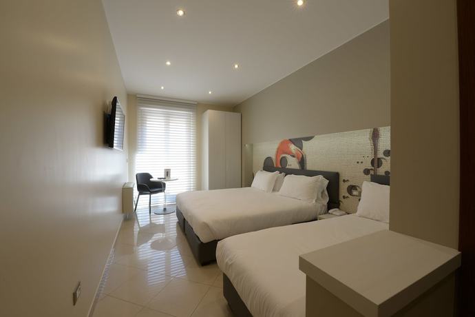 Imagen de la habitación del Hotel Imperiali. Foto 7