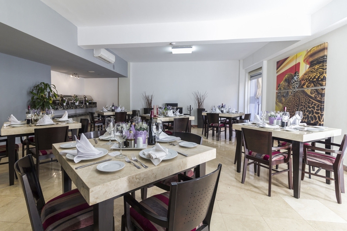 Imagen del bar/restaurante del Hotel Imperio De Angeles Executive Le&oacute;n By Real De Minas Business Class Le&oacute;n. Foto 5
