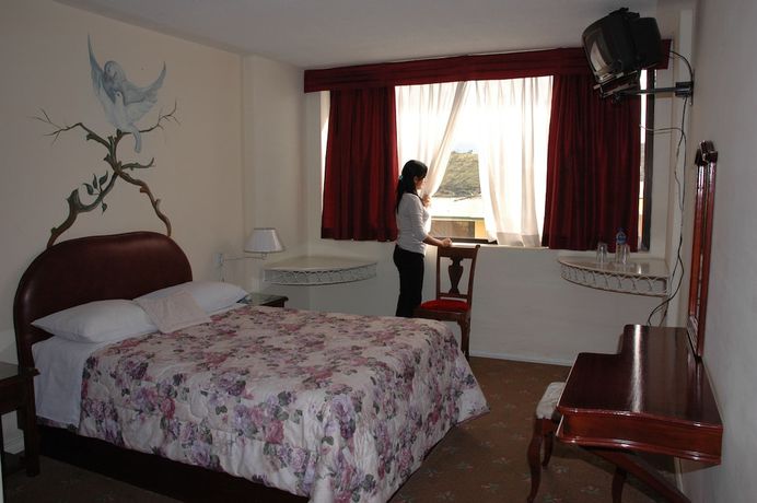 Imagen de la habitación del Hotel Imperio del Sol. Foto 9