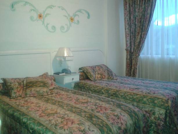 Imagen de la habitación del Hotel Imperio del Sol. Foto 12