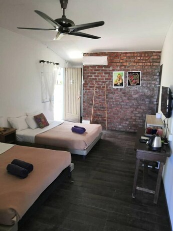 Imagen de la habitación del Hotel Impian Inn. Foto 12