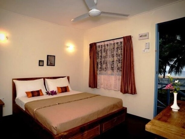 Imagen de la habitación del Hotel Impian Inn. Foto 13