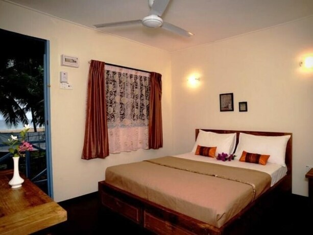 Imagen de la habitación del Hotel Impian Inn. Foto 18