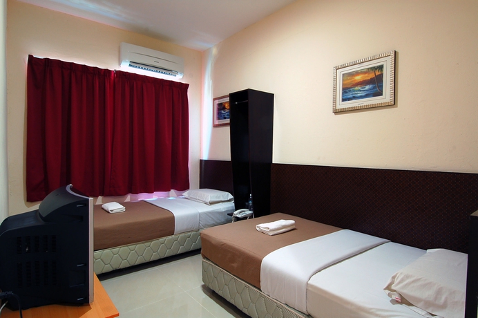 Imagen de la habitación del Hotel Impiana Mutiara. Foto 6
