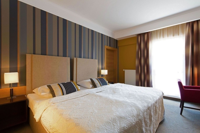 Imagen de la habitación del Hotel Impiq. Foto 11