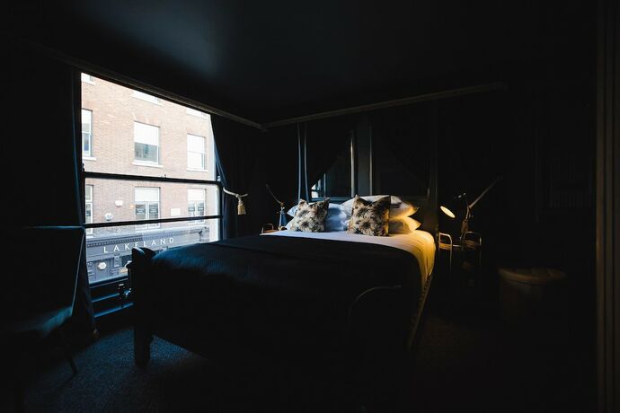 Imagen de la habitación del Hotel Impossible Motel. Foto 12