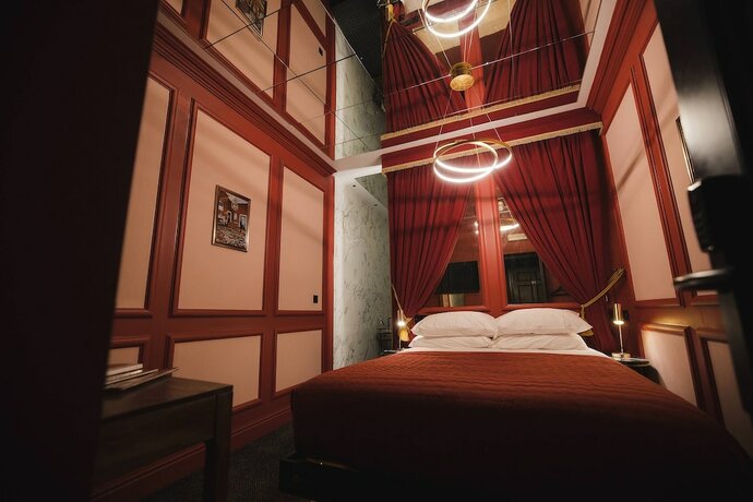 Imagen de la habitación del Hotel Impossible Motel. Foto 16