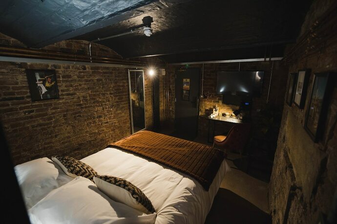 Imagen de la habitación del Hotel Impossible Motel. Foto 20