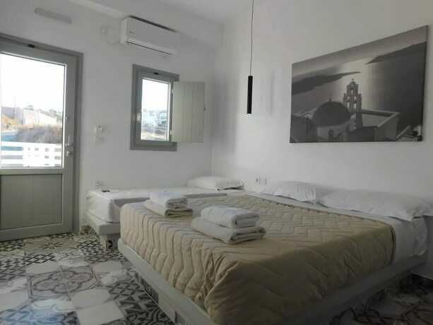 Imagen de la habitación del Hotel Impresionante Fira Rooms. Foto 16