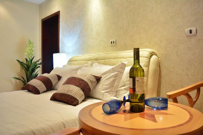 Imagen de la habitación del Hotel Impress. Foto 17