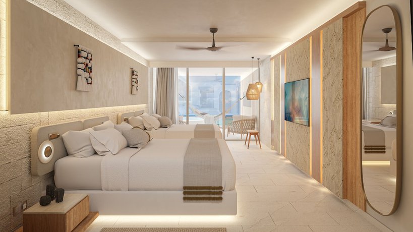 Imagen de la habitación del Hotel Impression Isla Mujeres By Secrets. Foto 2