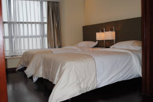 Imagen de la habitación del Hotel Impressions Pazhou Apartments. Foto 2