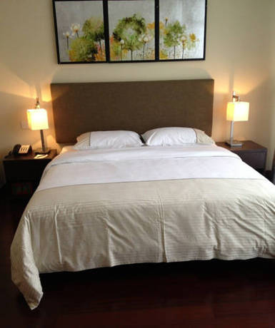 Imagen de la habitación del Hotel Impressions Pazhou Apartments. Foto 11