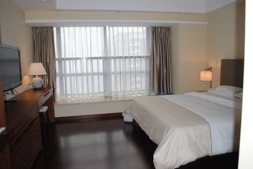 Imagen de la habitación del Hotel Impressions Pazhou Apartments. Foto 12