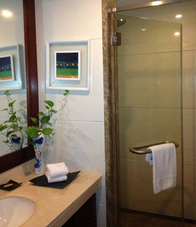 Imagen de la habitación del Hotel Impressions Pazhou Apartments. Foto 14