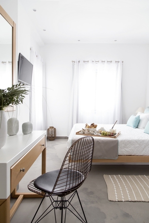 Imagen de la habitación del Hotel Impressive One. Foto 9