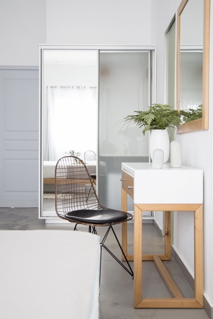 Imagen de la habitación del Hotel Impressive One. Foto 16