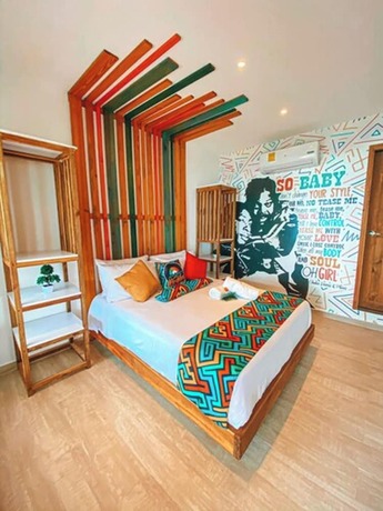 Imagen de la habitación del Hotel In Di House of Reggae Boutique. Foto 16