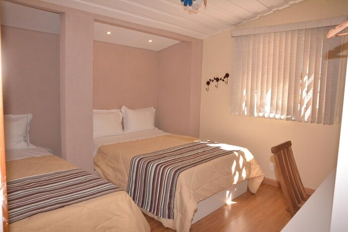 Imagen de la habitación del Hotel In Garden Pousada. Foto 34
