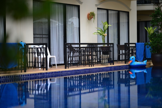 Imagen de la habitación del Hotel In On The Beach. Foto 13