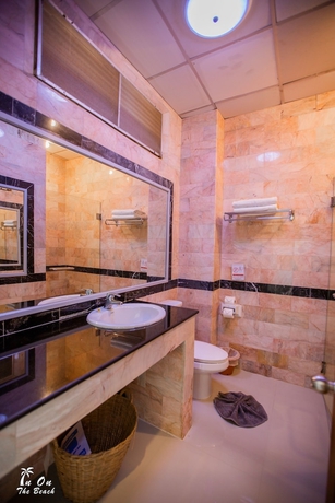 Imagen de la habitación del Hotel In On The Beach. Foto 15