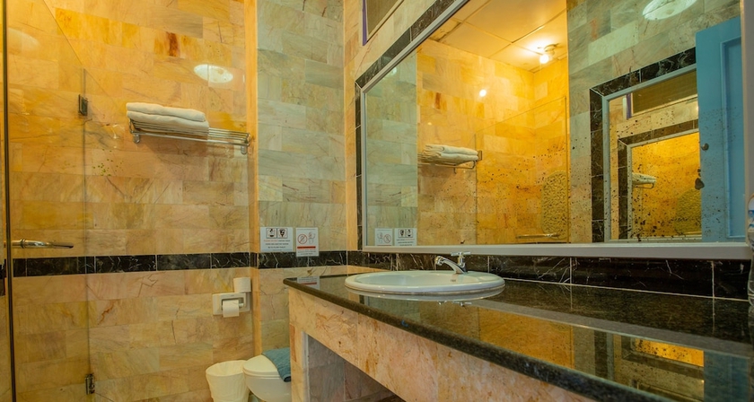 Imagen de la habitación del Hotel In On The Beach. Foto 16