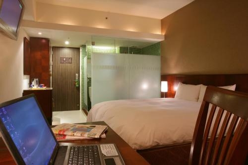 Imagen de la habitación del Hotel In One City Inn. Foto 6