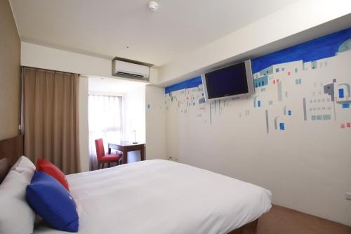 Imagen general del Hotel In One City Inn. Foto 2