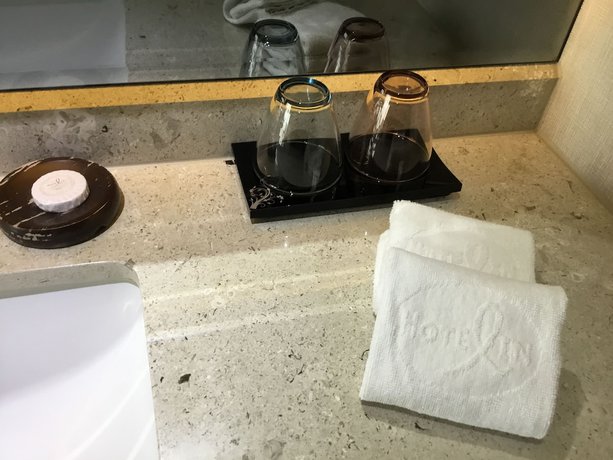 Imagen de la habitación del Hotel In, Pingzhen. Foto 6