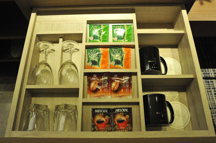 Imagen de la habitación del Hotel In, Pingzhen. Foto 10