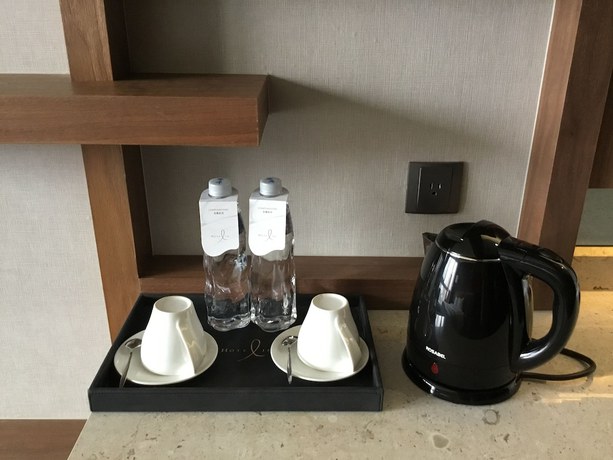 Imagen de la habitación del Hotel In, Pingzhen. Foto 14