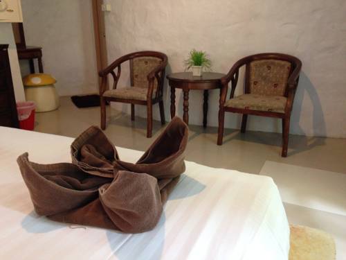 Imagen de la habitación del Hotel In Touch Resort. Foto 9