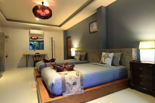 Imagen de la habitación del Hotel In Touch Resort. Foto 11