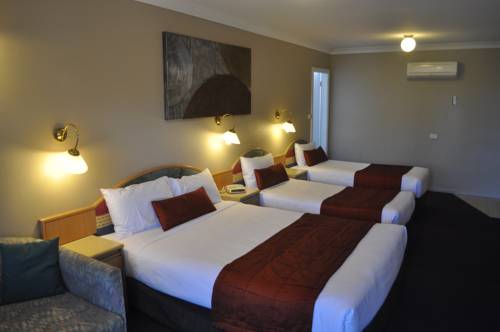 Imagen de la habitación del Hotel In Town Motor Inn. Foto 1