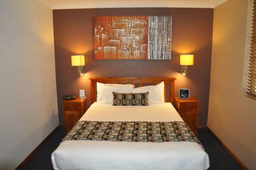 Imagen de la habitación del Hotel In Town Motor Inn. Foto 2