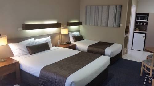 Imagen de la habitación del Hotel In Town Motor Inn. Foto 6