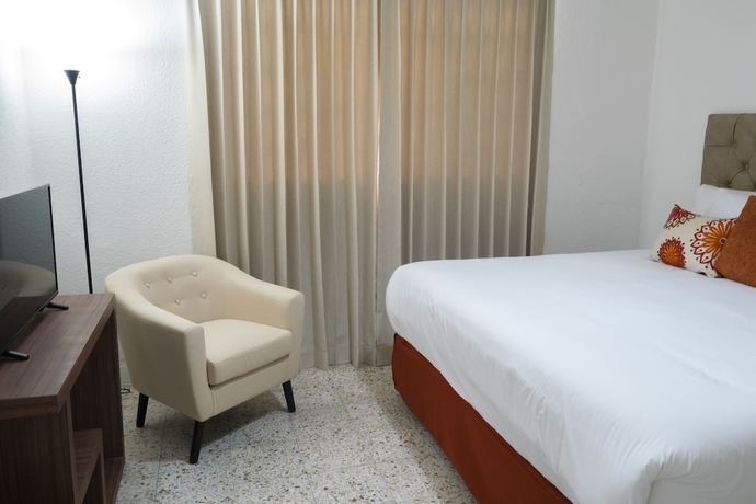 Imagen de la habitación del Hotel In and Out. Foto 8