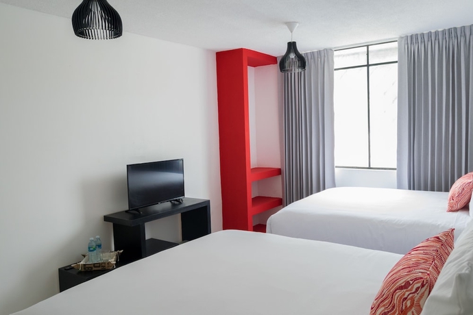 Imagen de la habitación del Hotel In and Out. Foto 10