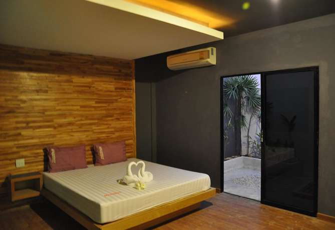 Imagen de la habitación del Hotel In and Out, Nakhon Pathom. Foto 4